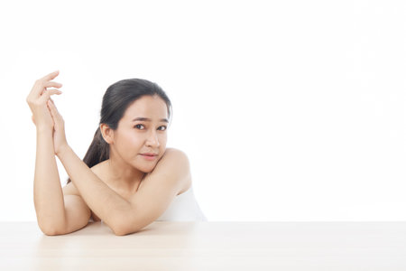 Beautiful Asian woman looking at camera smile with clean and fresh skin, Face care, Facial treatment, Cosmetology, beauty, and spa, Asian women portrait on white background, cosmetics conceptの写真素材