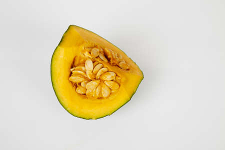 freshly sliced Japanese pumpkin(kabocha squash) isolated on white background