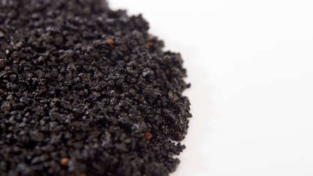 Organic fertiliser humic granules background texture