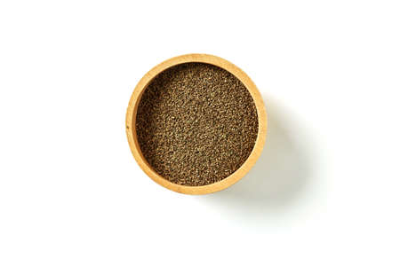 Heap Raw Organic Celery Seeds in a Bowl. Top viewの写真素材