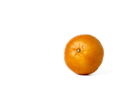 Fresh orange fruit on white background.