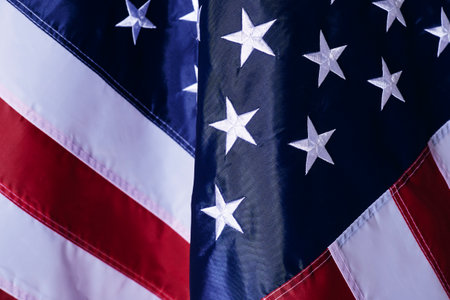 A close up shot of the waving flag of the United States of America with interesting texturesの写真素材