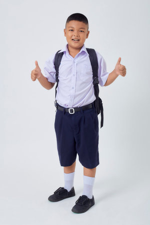 Portraits of Asian Boy Thai Country in School Uniform Isolated On White Backgroundの写真素材
