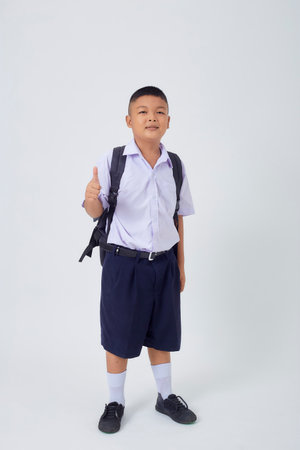 Portraits of Asian Boy Thai Country in School Uniform Isolated On White Backgroundの写真素材