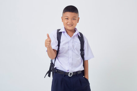 Portraits of Asian Boy Thai Country in School Uniform Isolated On White Backgroundの写真素材
