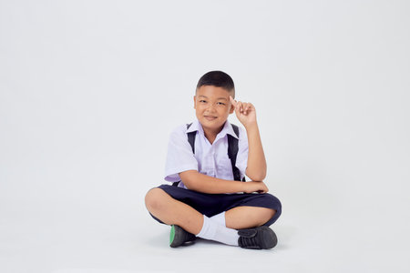 Portraits of Asian Boy Thai Country in School Uniform Isolated On White Backgroundの写真素材