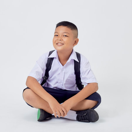 Portraits of Asian Boy Thai Country in School Uniform Isolated On White Backgroundの写真素材