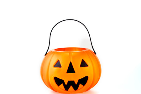 Halloween Jack o Lantern Pumpkin with a spooky face on a white backgroundの写真素材