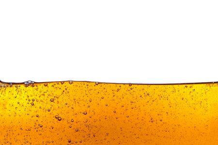 Beautiful wave of high viscosity of base oil and air bubble inside the oil isolated on white background. It was used in automotive and industrial application , used as wallpaper, industrial conceptの写真素材