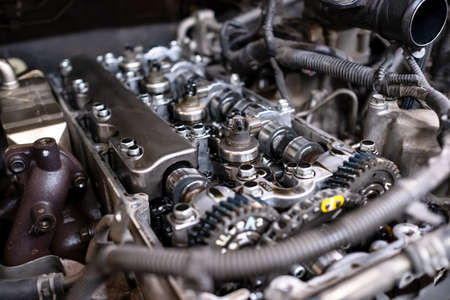 Diesel engine during service, or maintenance at the garage. The internal design of the old engine. Engine car spare part. Explore and check up wear scare of the gearbox and see depositの写真素材