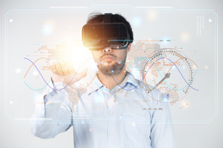 Closeup of bearded young man wearing virtual reality goggles in modern coworking studio. Smartphone using with VR headset.の写真素材