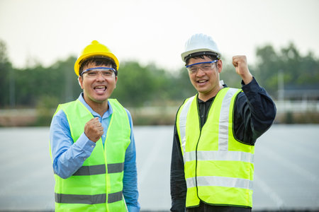 Asian engineer and technician standing in the solar power plant. Engineer concept.の写真素材