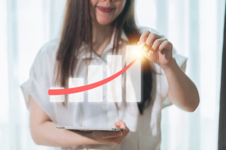 Businesswoman  hand touch growth chartの写真素材