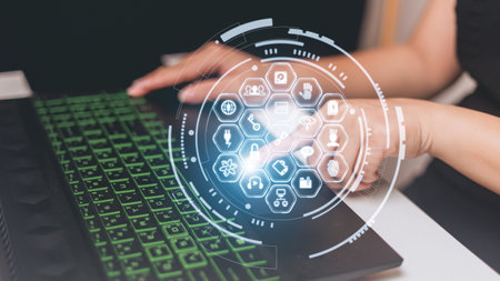 Close up of businesswoman hands using laptop computer in office with virtual icon network.