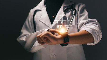 Close up image of female doctor with stethoscope holding light bulbの写真素材