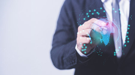 Businessman hand drawing global network connection on virtual screen. Business and technology concept.の写真素材