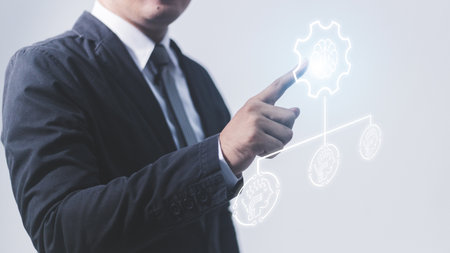 Businessman hand drawing gear icon on virtual screen. Business and technology concept.の写真素材