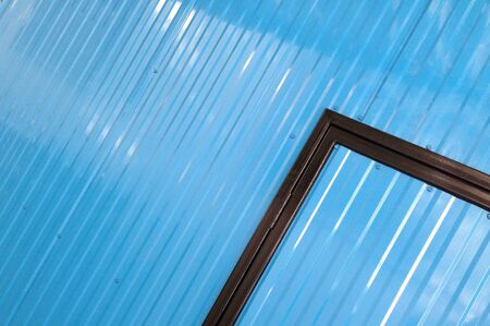 Blue color corrugated metal sheet as backgroundの素材