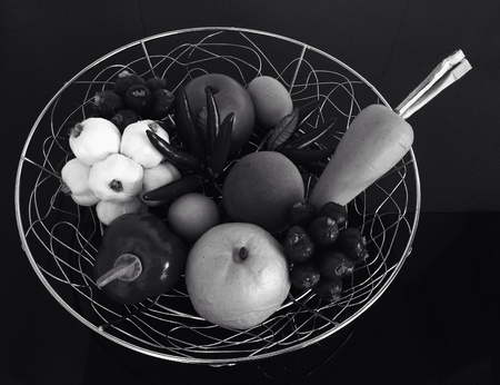 vegetables in basket with Carrots, onion, garlic, chilli peppersの素材