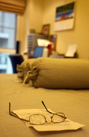 Glasses on the letterの写真素材