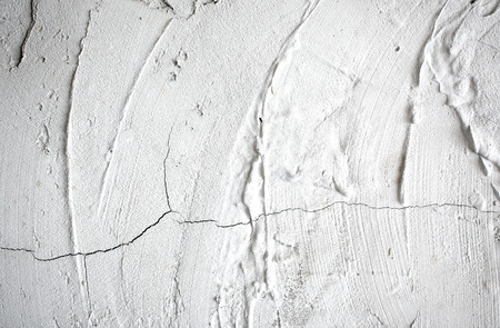 Cracks in cement wallの写真素材