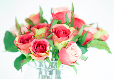 bouquet of fresh multicolored roses in vaseの写真素材