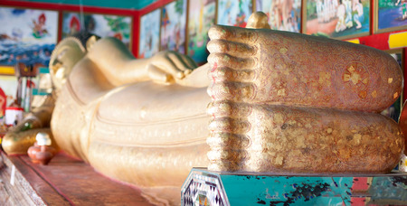 The Feet of Buddha on a reclining Buddha statueの写真素材