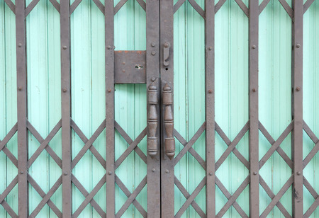 close up of green steel door can be used for interior design