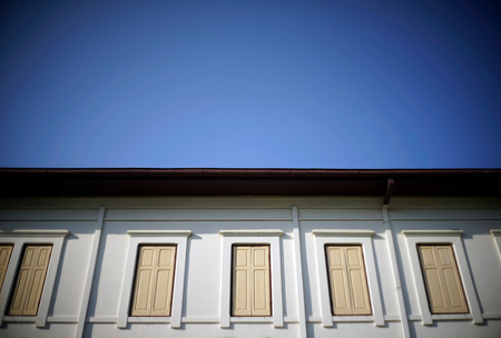 The old style window with blue sky
