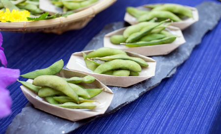 Edamame nibbles, boiled green soy beans, japanese foodの写真素材