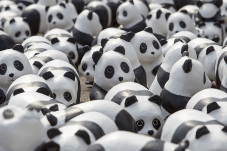 CHIANG MAI,THAILAND March 19, 2016 : Pandas World Tour by WWF exhibition of the 1,600 paper mache pandas during a flash mob  world tour made by French artist Paulo Grangeon at Tha Phae Gate, Chiang Mai.のeditorial素材