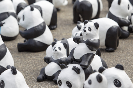 CHIANG MAI,THAILAND March 19, 2016 : Pandas World Tour by WWF exhibition of the 1,600 paper mache pandas during a flash mob  world tour made by French artist Paulo Grangeon at Tha Phae Gate, Chiang Mai.のeditorial素材