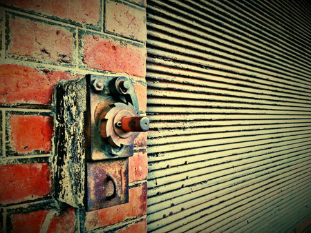 Red brick wall with sliding door