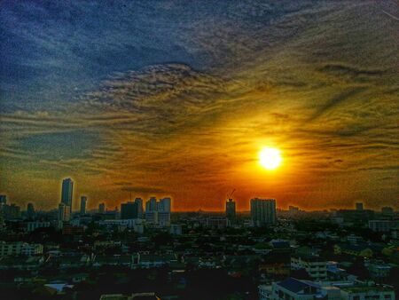 Sunset and cityの写真素材