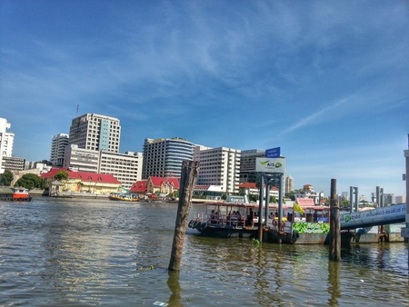 Bangkok, Thailand - July 6, 2014 : Ferry boats is crossing between Bangkok and Thonburi in Chao Phraya River.のeditorial素材