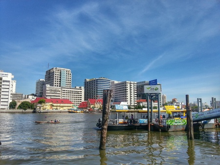 Bangkok, Thailand - July 6, 2014 : Ferry boats is crossing between Bangkok and Thonburi in Chao Phraya River.のeditorial素材