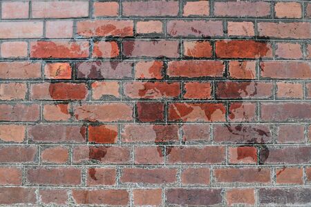 Red Brick wall texture background with world mapの写真素材