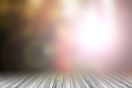 Wood terrace and Abstract blurred nature background. Bird of paradise flower and gardan background with sunlightの写真素材