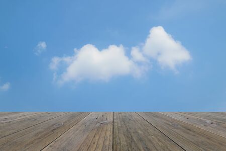 Wood terrace and Blue sky and white cloudの写真素材