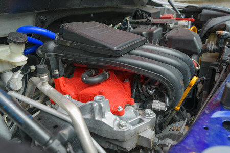Closeup photo of a clean car engine. Selective focus on air flowの写真素材