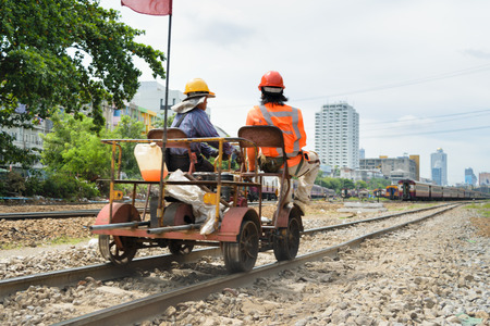 Bangkok, Thailand - September 5, 2015 : Unidentified railway employees working for checking of railway tracks at State Railway of Thailand.のeditorial素材