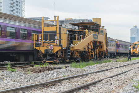 Bangkok, Thailand - September 5, 2015 : Restoration the railroad tracks by Plasser and Theurer machine at State Railway of Thailand.のeditorial素材