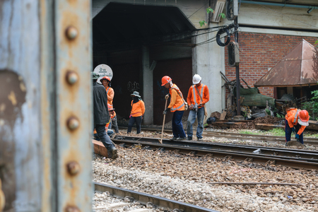 Bangkok, Thailand - September 5, 2015 : Unidentified railway employees working for restoration the...