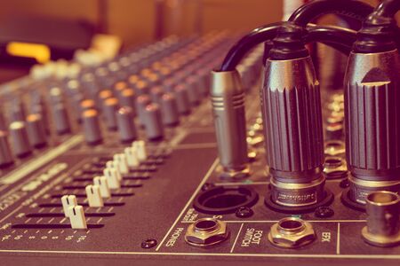 Sound mixer control with volume buttons. , process in vintage style