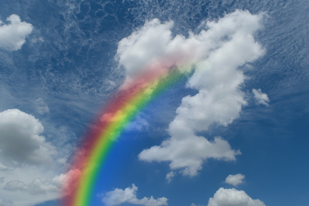 Nature cloudscape with blue sky and white cloud with rainbowの写真素材