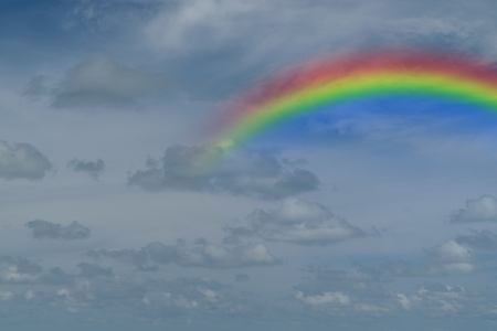 Nature cloudscape with blue sky and white cloud with rainbowの写真素材
