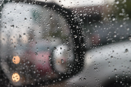 Water drops steam on car window glass backgroundの写真素材