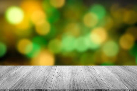Wood terrace and Blurred of Abstract bokeh background of Christmas tree decoration for merry christmas Xmas and happy new year , process in vintage styleの写真素材