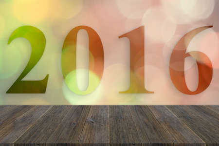 Wood terrace and Abstract bokeh background of Christmas tree decoration for merry christmas Xmas and happy new year 2016の写真素材