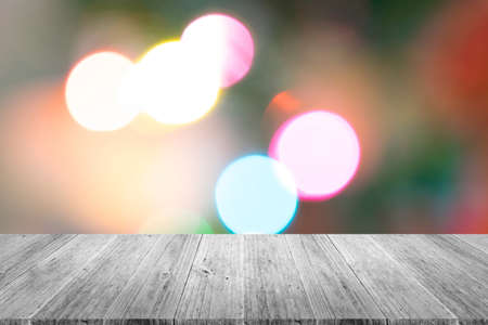 Wood terrace and Blurred of Abstract bokeh background of Christmas tree decoration for merry christmas Xmas and happy new yearの写真素材